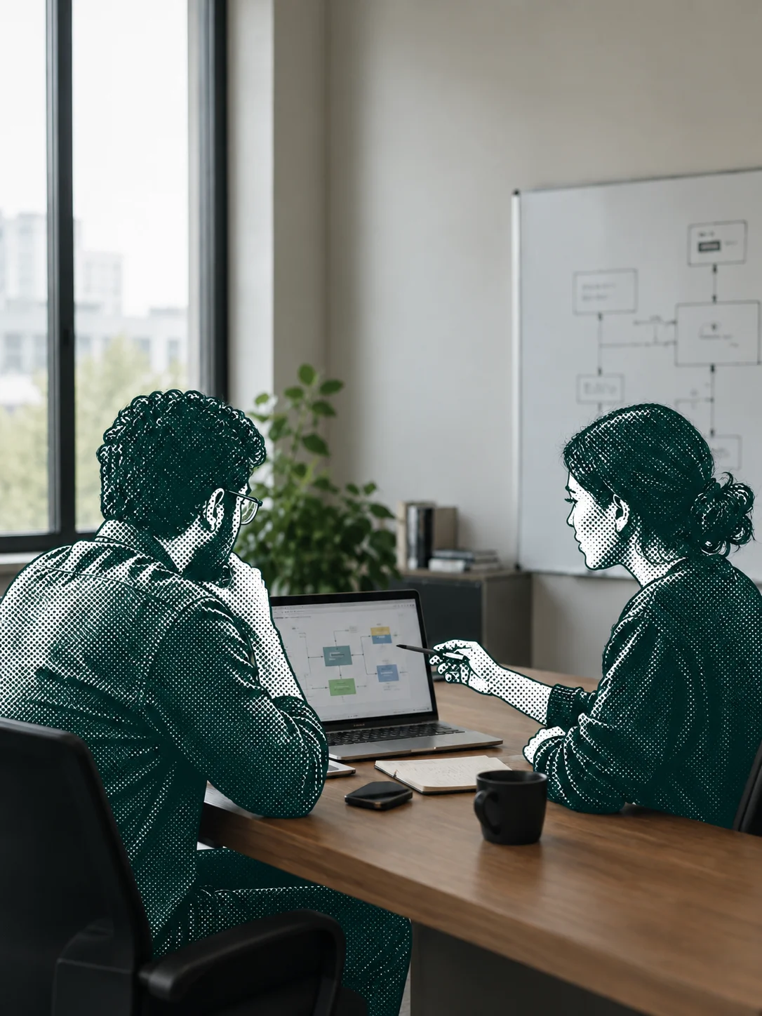 Two people planning a software project together